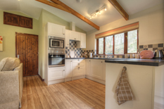 a view of the kitchen area at Waldon Valley self catering lodge in devon