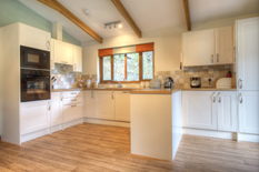 a view of the kitchen area at Waldon Valley self catering lodge in devon